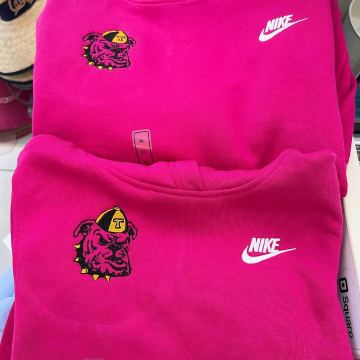 Bulldog mascot embroidered on pink hoodies