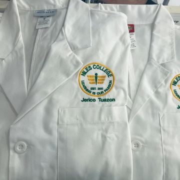 Niles College logo on lab coats