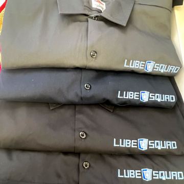 Lube Squad logo on work shirts