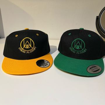 Urban Alchemy logo caps
